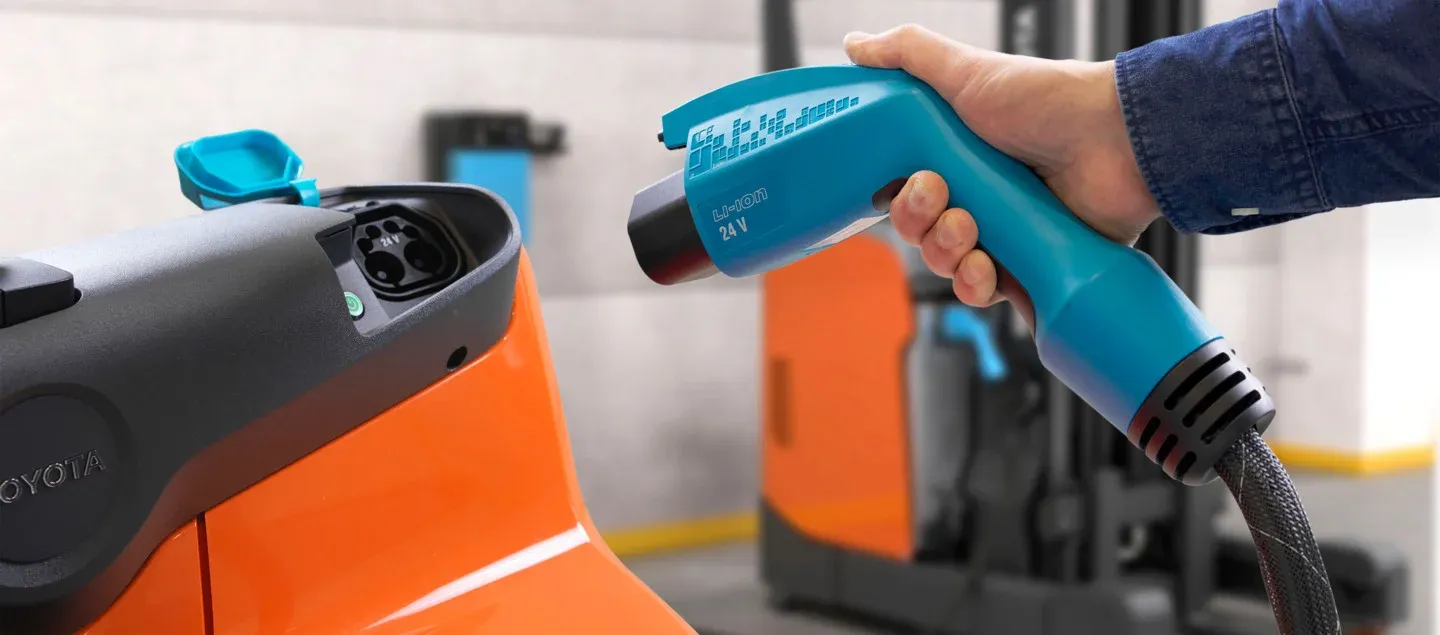 LWI160 with cobra charger w Hand_with Reflex in background.webp